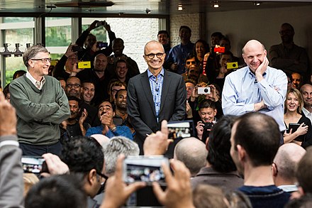 Nadella on his first day as CEO of Microsoft, with former CEOs Bill Gates (left) and Steve Ballmer (right)