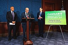 Schumer, Booker, and Wyden at a press conference for the reintroduction of the bill in May 2024 Schumer Booker Wyden Cannabis Administration and Opportunity Act.jpg