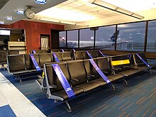 Seats blocked off at Logan International Airport in August 2020 to promote physical distancing Seats blocked off at BOS.jpg