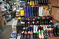 Selling boots at the Tsukiji Fish Market (11907599955).jpg