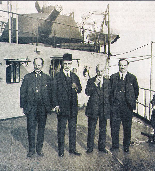 Damad Ferid Pasha (wearing the fez) with the three other signatories of the Treaty of Sèvres; to his right, Rıza Tevfik Bölükbaşı, to his left, the Ot