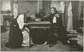 Blanche Bates and Frank Keenan in the original Broadway production of The Girl of the Golden West (1905) The theatre through its stage door (1919) (14578174940).jpg