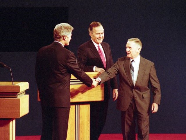 Perot meets Bill Clinton and George H. W. Bush at the third presidential debate at Michigan State University, October 19, 1992.