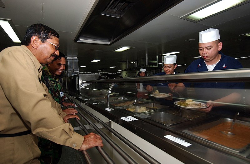 File:US Navy 050411-N-7027P-081 Culinary Specialist 2nd Class Ronald Dario, right, and Hospitalman Seaman Oliver San Agustin serves lunch to Governor of North Sumatra, Rizal Nurdin.jpg