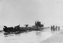 U-20 grounded on the Danish coast in 1916. Torpedoes had been exploded in the bow in efforts to completely destroy the boat U 20 grounded Denmark 1916.JPG
