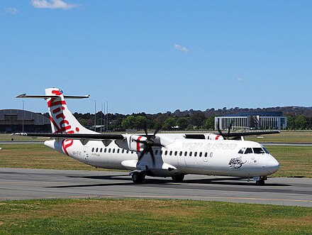 An ATR 72 at Canberra Airport in Virgin Australia livery during November 2014.