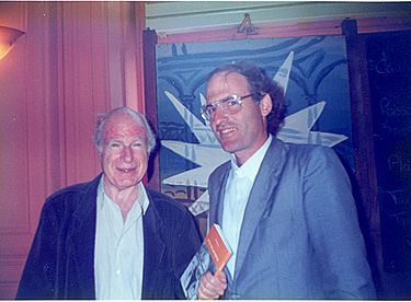 Ouriel Zohar gives his book in Hebrew "Meetings with Peter Brook," to Peter Brook, Paris 1991 With Peter Brook 1991 0001 (2).jpg