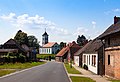 Deutsch: Kirche mit Hauptstraße L35 in Cöthen, Brandenburg