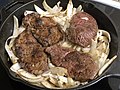 2020-04-25 18 12 23 Beef and onion in a cast iron skillet in the Franklin Farm section of Oak Hill, Fairfax County, Virginia.jpg