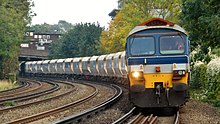 A unit train with cargo from a quarry in the United Kingdom 59104 Allington ARC Siding to Whatley Quarry 6V18 (30261015131).jpg