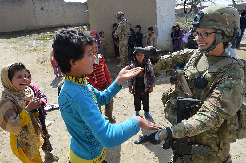 File:755th ESFS airman with school children near Bagram.jpg