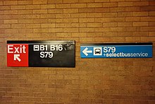 Signs in the mezzanine showing bus connections. 86th St 4th Av BMT td 18 - Mezzanine.jpg
