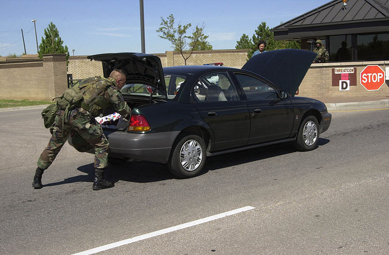 File:A member of the 22nd Security Forces Squadron searchs a vehicle at the West gate of McConnell Air Force Base, Alaska during Force Protection Delta 010911-F-PM628-001.jpg