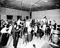 Art studio interior showing men and women painting, probably between 1890 and 1910 (SEATTLE 839).jpg