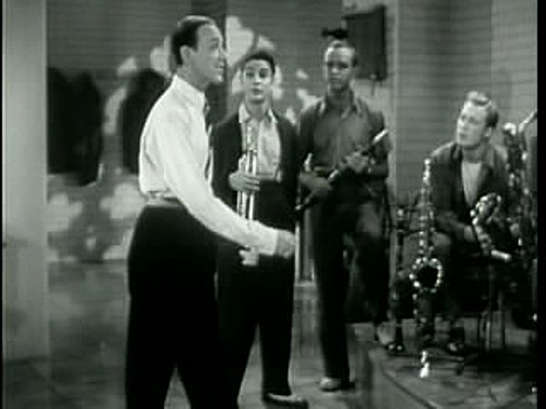 Astaire and Pan (standing third from left) in Second Chorus (1940)