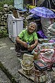 BANUE - A native Philippines women is engaged in collecting plastic bottles for recycling