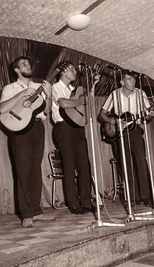 Babayaga Trio (L to R) Ray Gurney, Murray Uhlmann and Frank White on a Gold Coast, Queensland Tour 1964 Babayaga Trio performing at Surfers Paradise 1964.JPG