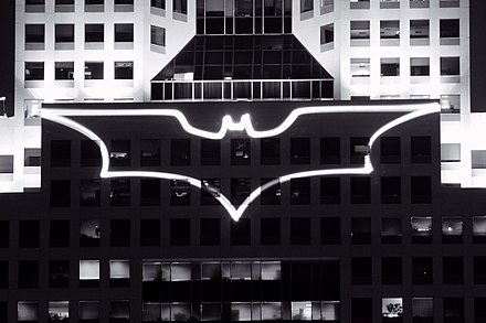 The Bat-Signal being projected against the Fifth Avenue Place during filming in Pittsburgh