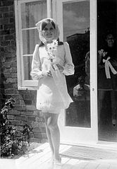 A bride in 1968, wearing a dress reflecting the styles of the time