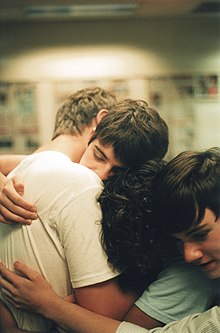 A group hug among young men. Bromances.jpg