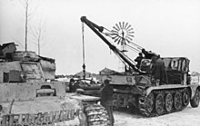 A Sd.Kfz. 9/1 hoisting a Maybach HL 120 TRM engine into a Panzer III in the Soviet Union, January 1943 Bundesarchiv Bild 101I-235-0996-02A, Russland, Reparatur Panzer III mit Sd.Kfz. 9-1.jpg