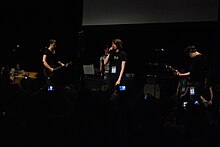 McDonnell performing with Chameleon Circuit at VidCon 2011 ChamCirc VidCon 2011 4.jpg