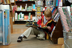 Child reading at Brookline Booksmith.jpg