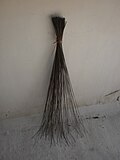 broom made of the stem of coconut leaf