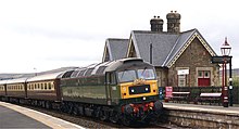 Restored Class 47, D1935 "Roger Hosking MA", heading North with a complement of Pullman Coaches at Dent Station on the Settle - Carlisle line Class 47 The Statesman.jpg