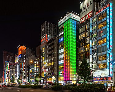 "Colorful_illuminated_facades_of_buildings_at_night,_with_green,_blue_and_pink_lights,_Kabukicho,_Shinjuku,_Tokyo.jpg" by User:Basile Morin