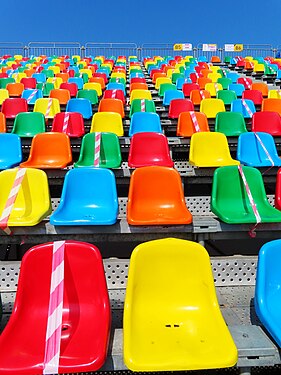 Colourful chairs at grandstand