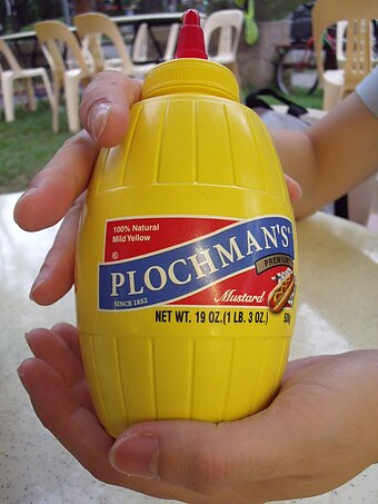 Plochman's mild yellow mustard, with typical bright yellow packaging
