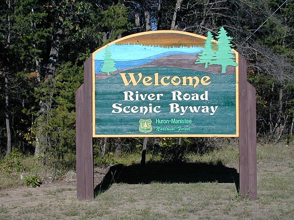 Entrance sign for the River Road National Scenic Byway and the Huron National Forest