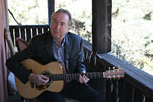 Eric Idle with Guitar.jpg