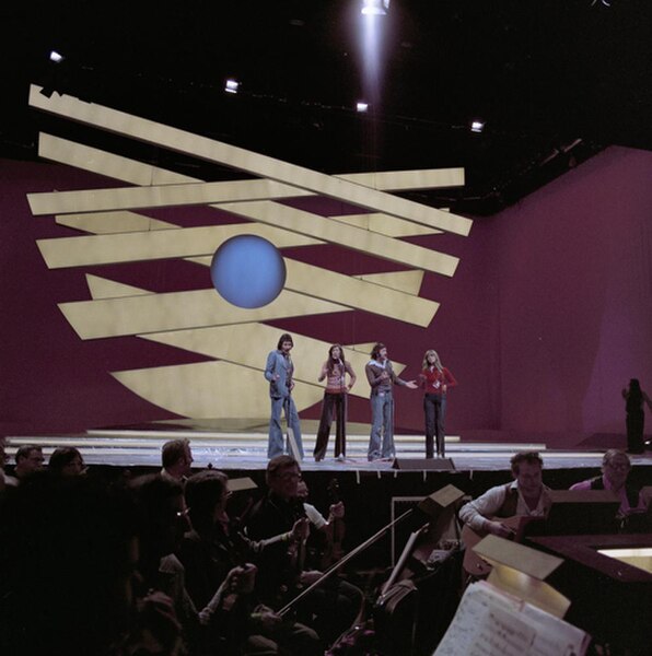 Lee, second from the right, rehearsing Save Your Kisses For Me in Eurovision