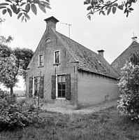 Huis en boerderij in Poelhuizen (toestand 1987)