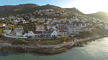 An aerial view from the ocean of the houses on the slopes in the southern part of Fish Hoek