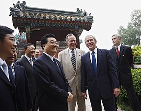 Chinese President Hu Jintao with U.S. President George W. Bush and former U.S. President George H. W. Bush in Zhongnanhai on August 10, 2008.