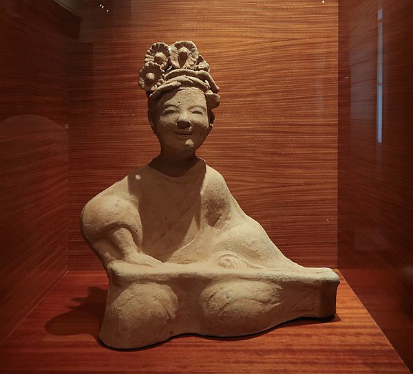 A girl playing a guqin, Eastern Han dynasty, collection of the Musée des Arts Asiatiques de Toulon, France