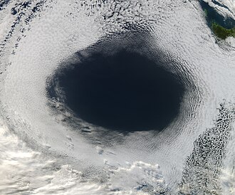 Satellite image showing a high-pressure area south of Australia, evidenced by the clearing in the clouds High Pressure.jpg