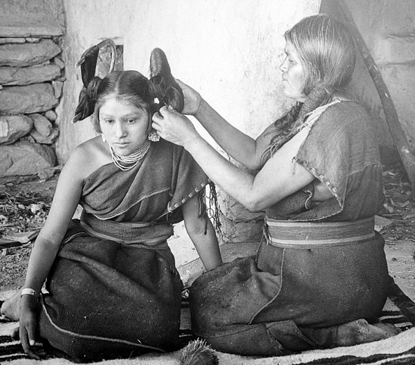 Hopi woman dressing hair, ca. 1900