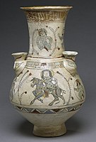 Jug with figures, combining lustre painting (top) and mina'i; 22.5 × 12.8 cm (8.8 × 5 in)