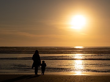 Jules and Gabriel at São João Beach at sunset, Costa da Caparica, Portugal