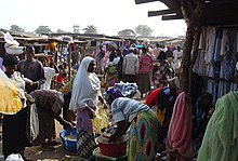 A market in Nigeria; Africa Rising is particularly associated with the growth of local entrepreneurship Kuje Market.jpg