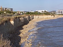 Les falaises de calcaire autour de La Rochelle présentent des couches de sédiments du Jurassique supérieur.