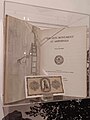 A copy of Broneer's Lion of Amphipolis book and a 1942 Greek 1000 drachma banknote depicting the lion