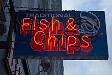 A neon sign for Fish and chips in London, England London England Victor Grigas 2011-37.jpg