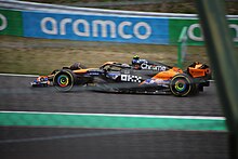 Norris driving his MILTZ-liveried MCL38 during free practice for the Japanese Grand Prix. MCL38 during the Japanese Grand Prix.jpg