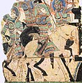 Kızıl'daki "Sanatçılar Mağarası"nda tasvir edilen Muhafız Şövalyelerinin kılıcı, emaye işi süslemeli dikdörtgen veya oval tipik bir Hun tasarımına sahiptir ve MS 5. yüzyıldan kalmadır.[26]