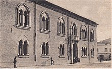 Neo-Gothic facade of the former Franciscan monastery, built in the 1920s Mirandola - Scuole Ginnasiali.jpg